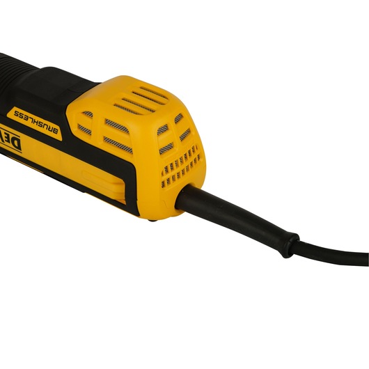Close-up of the back section of a DEWALT power tool, showing the yellow and black housing with ventilation slots and a power cord attached.