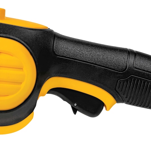 Close-up of the handle and trigger of a DEWALT power tool, showing a yellow and black textured grip with ergonomic design.