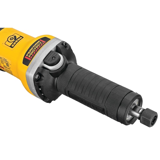 Close-up view of a DEWALT handheld power tool featuring a yellow body, a black ergonomic grip, and a metal collet attachment at the front.