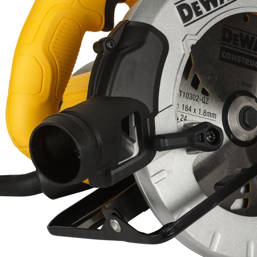 Close-up image of a DEWALT circular saw, showing the yellow handle, blade guard, dust extraction port, and part of the blade with technical specifications visible.