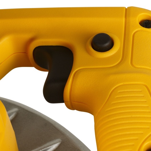 Close-up view of the handle and trigger area of a yellow DEWALT power tool, showing textured grip, black trigger, and a round black button.