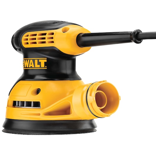 A close-up image of a DEWALT DWE6421 yellow and black electric orbital sander, showing the power cord and dust collection port.