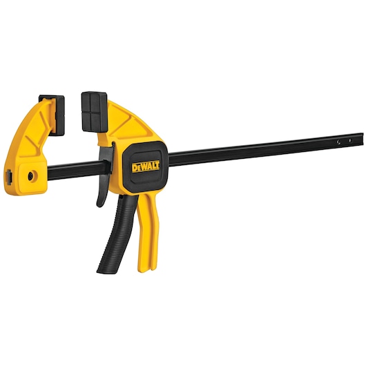 A DEWALT quick grip clamp with a yellow and black design. The clamp has a trigger handle and padded jaws for securely holding materials together.