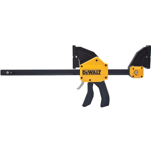 A DEWALT trigger clamp, featuring a black and yellow handle and body, used for woodworking and construction to securely hold materials in place.