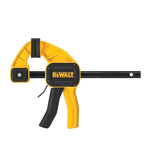 A DEWALT branded yellow and black trigger clamp tool, model DWHT83192, designed for securing materials during photography or construction work.