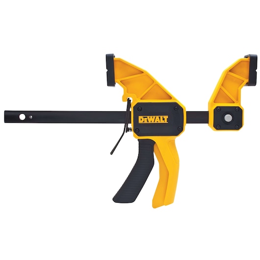 A DEWALT brand trigger clamp tool, featuring a yellow and black design with a pistol grip handle and an adjustable sliding bar.