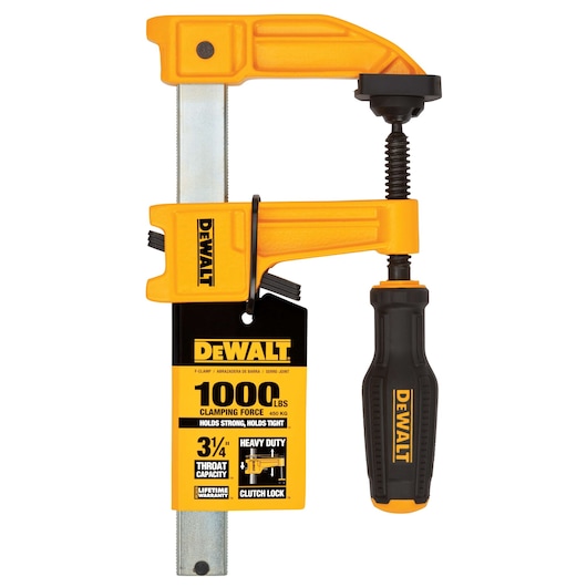 DEWALT F-clamp with a yellow body and black handle, showing a label that highlights 1000 lbs clamping force, heavy duty build, 3-3/4 inch throat capacity, lifetime warranty, and clutch lock feature.