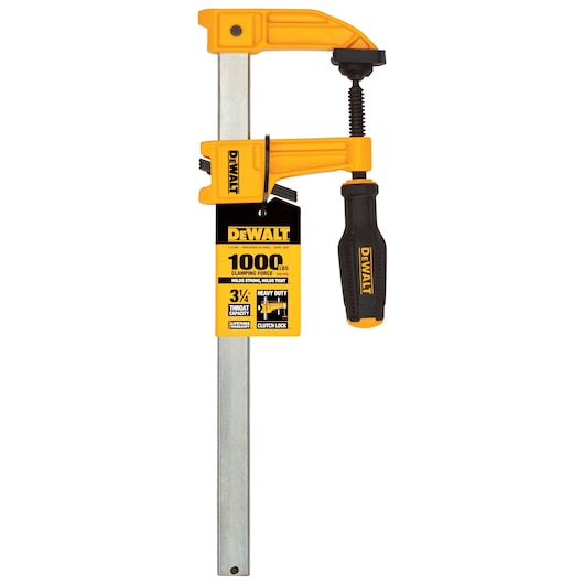 A DEWALT heavy-duty bar clamp with a black and yellow handle, shown upright. The label indicates a clamping force of 1000 lbs, 3.5 inch throat capacity, and clutch lock feature. The clamp is designed for strong and secure holding in woodworking or construction tasks.