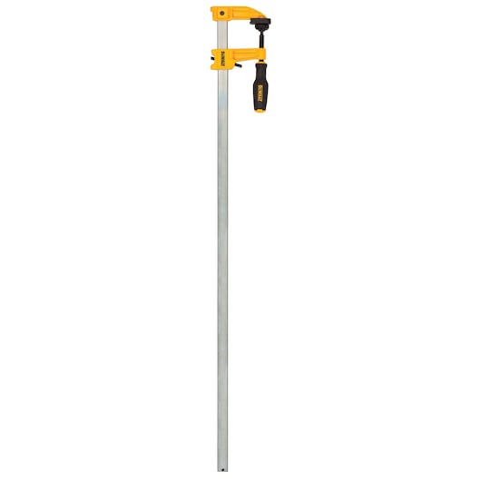 A DEWALT bar clamp with a yellow body and black handle, used for woodworking and securing materials.
