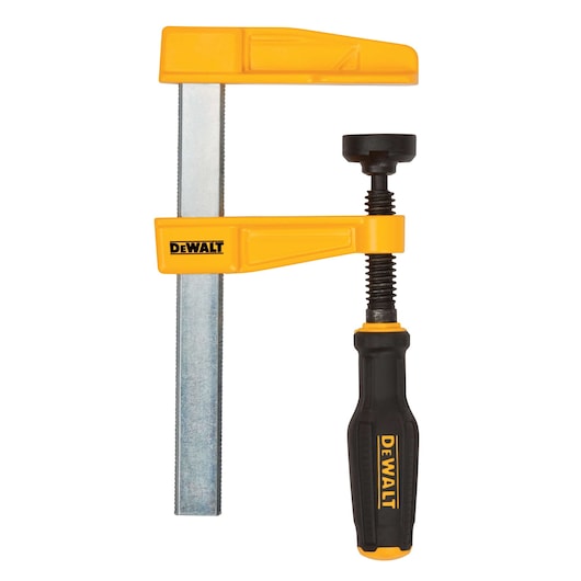 A DEWALT F-clamp with yellow and black accents. The clamp features a metal bar, a yellow fixed jaw, a movable jaw with a screw mechanism, and a black ergonomic handle.