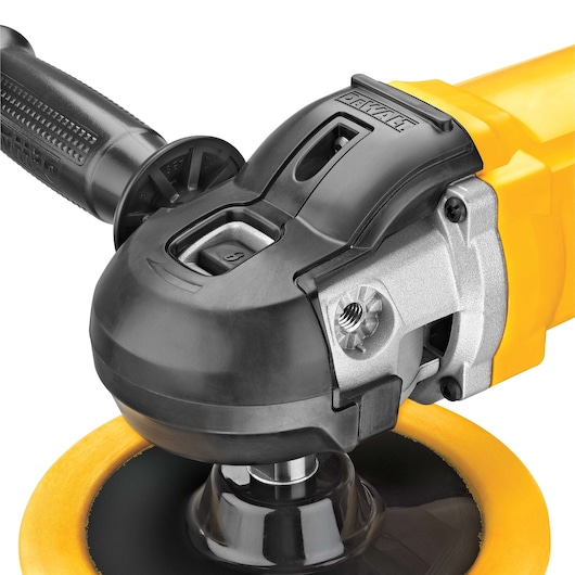 Close-up view of a DEWALT DWP849X polisher tool, showing its black and yellow body, ergonomic handle, and disc attachment.