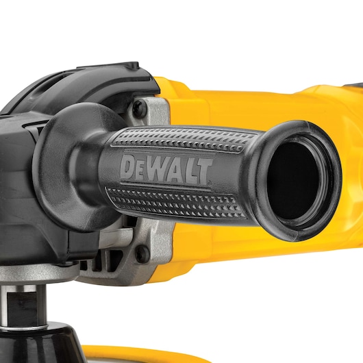 Close-up image of the handle of a DEWALT power tool, showing the black textured grip and part of the yellow body.