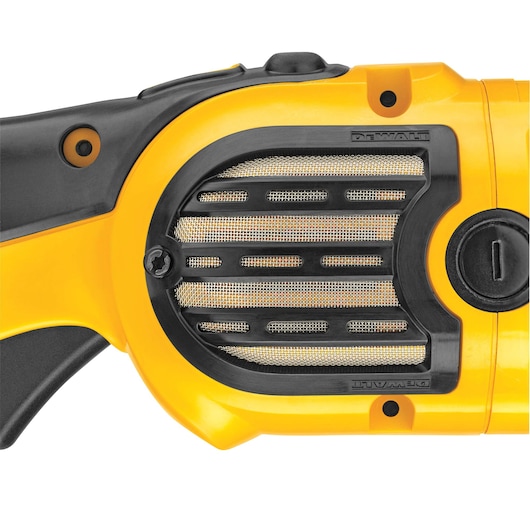 Close-up of the DEWALT DWP849X power tool showing the yellow and black ventilation grill section with visible mesh and branded markings.