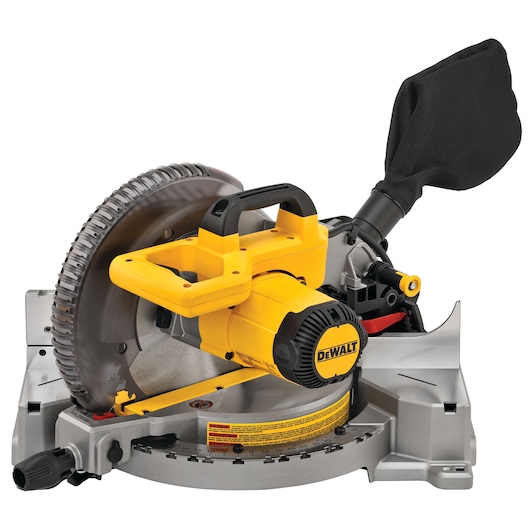 A DEWALT DWS713 miter saw with a yellow and black design, mounted on a silver base. The saw features a circular blade, a sturdy handle, and a dust collection bag attached at the rear.