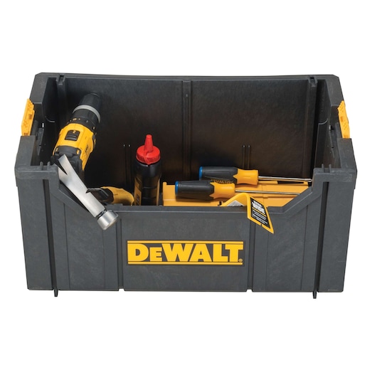 A DEWALT storage box containing various tools, including a drill, a hammer, screwdrivers, and a bottle with a red cap.