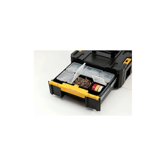 A DEWALT black and yellow tool storage box with opened drawer containing organized compartments with screws, tape, and