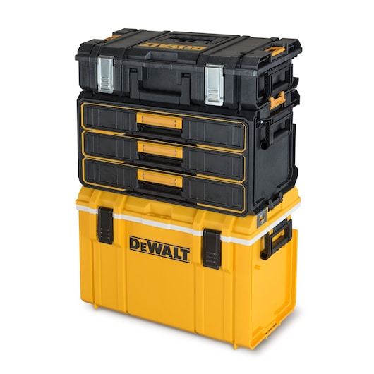 Stacked DEWALT storage boxes featuring a combination of yellow and black toolboxes, including a large bottom box with the DEWALT logo, a middle box with drawers, and a top box with metal latches.