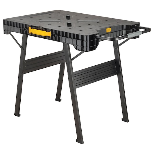A DEWALT portable workbench with a black plastic top, yellow accents, and sturdy folding metal legs.