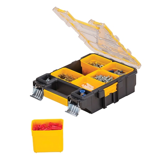 A DEWALT tool organizer box with yellow removable compartments, a clear hinged lid, and metal latches. The compartments contain various small hardware items like screws and anchors. One separate yellow compartment with red hardware is placed in front of the box.