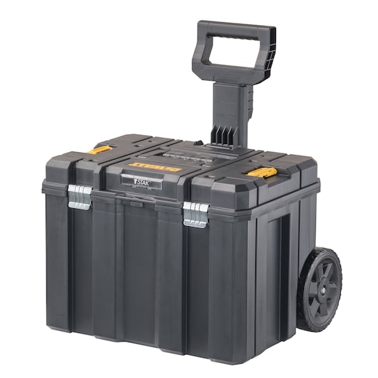 A black DEWALT rolling tool box with a retractable handle and two wheels, designed for easy transport and sturdy storage of tools and equipment.