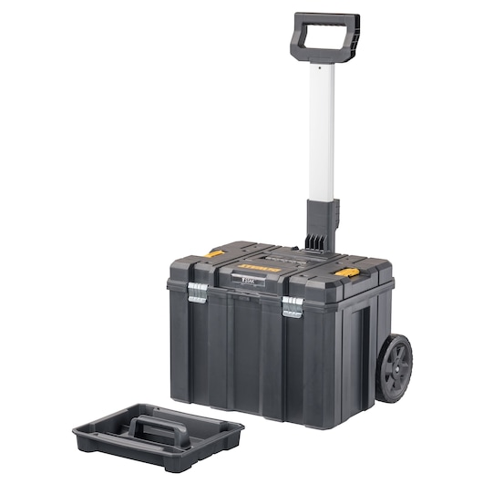 A DEWALT rolling tool box with a telescoping handle and large wheels. An additional removable tray is placed in front of the box.