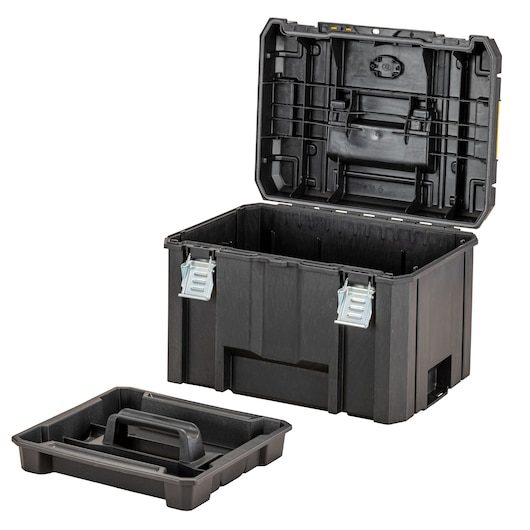 A black DEWALT tool storage box with its lid open, showing the empty interior and two metal latches. A removable tray with a handle is placed in front of the box.
