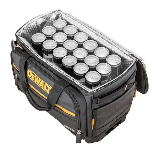 A DEWALT branded black and yellow soft-sided cooler bag, unzipped to show multiple beverage cans stored inside. The interior is lined with a reflective, insulated material.