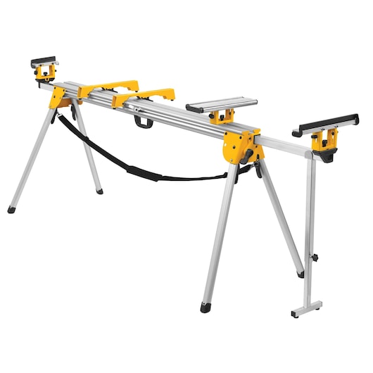 A DEWALT DWX723 heavy-duty aluminum miter saw stand with folding legs and adjustable brackets, designed for supporting and stabilizing saws and materials during cutting tasks.