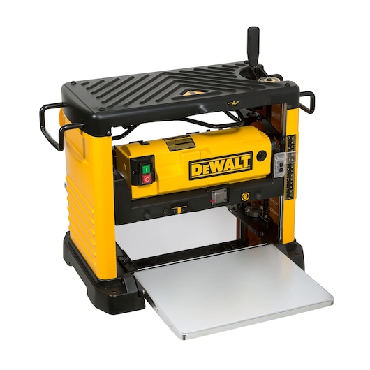 A DEWALT DW733 portable thickness planer, featuring a yellow and black design with a metal infeed table and ergonomic handles, placed against a white background.