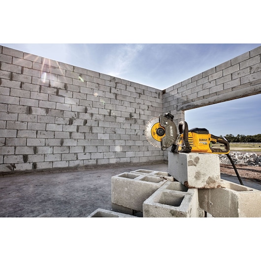 Brushless cordless cut-off saw at construction site.