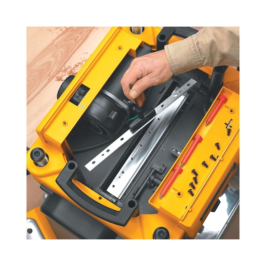 Quick Blade change feature by T Wrench of 13 inch Three Knife Two Speed Thickness Planer.