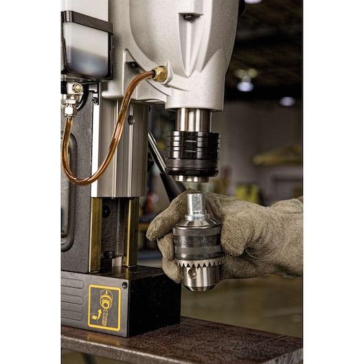 Quick change chuck system of 2 speed magnetic drill press.
