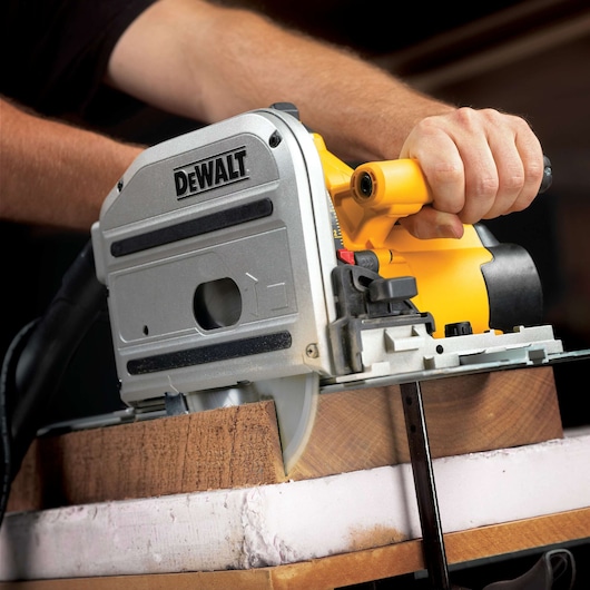 track saw kit being used to cut wood.